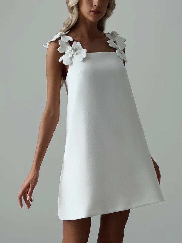 Mini dress with spaghetti back-Elegant White Mini Dress with Floral Shoulder Detail